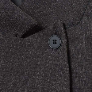 Classic charcoal grey charcoal suit jacket with a formal lapel and black button detail