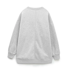 Back view of a grey oversized cotton sweatshirt with drop shoulder and ribbed cuffs