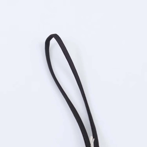 Detail shot of the sleek black adjustable straps with high-quality satin texture
