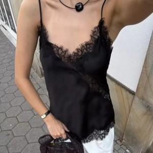Chic black satin camisole top featuring delicate eyelash lace trim and slim fit design