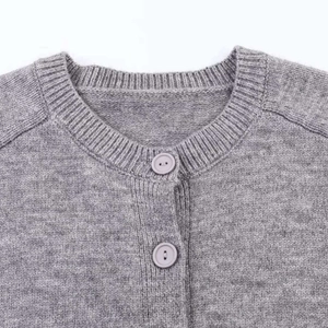 Women's casual grey crew neck buttoned knit cardigan with rib detailing and soft fabric