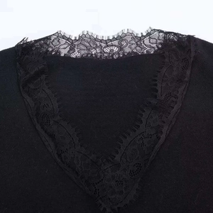 Women's black V-neck knit sweater with delicate eyelash lace trim detailing