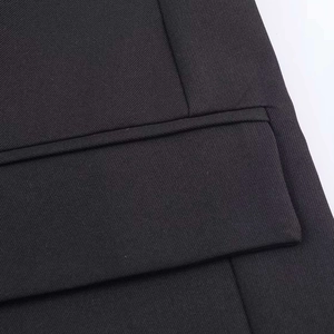Elegant black satin tie blazer jacket with smooth twill texture and flap pocket details