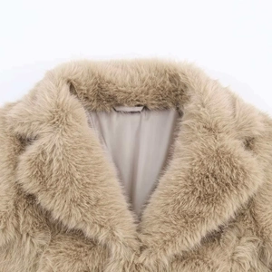 Elegant camel faux fur short coat featuring a wide lapel design and soft inner lining