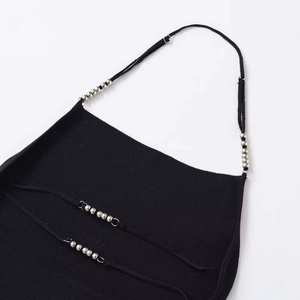Slim fit black knitted halter top with metallic silver bead details and adjustable straps