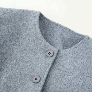 Women's grey wool blend long coat featuring a chic round neck and double-breasted buttons