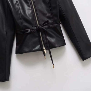 Women's black faux leather jacket with gold zipper and adjustable drawstring waist belt