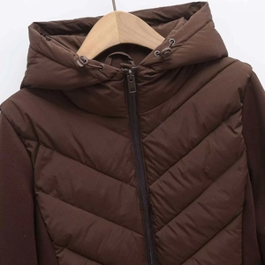 Deep brown quilted hooded jacket with V-shaped stitching and full zip closure