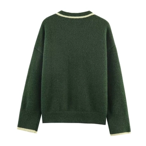 Forest green knitted sweater with ivory contrast trim on crewneck and cuffs, back view