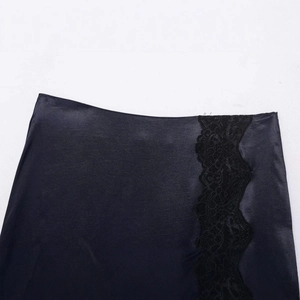 Women's black satin midi skirt featuring delicate floral lace trim and a side slit design