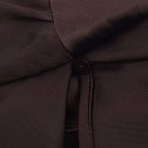 Close-up of silk-textured chocolate brown dress showing buttons and fine fabric details