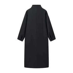 Back view of black long-line coat with high collar and sleek vertical seam detail