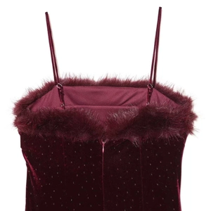 Elegant burgundy velvet mini dress with faux fur trim and shimmering sequin details