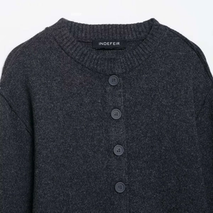 Deep grey knit cardigan with a classic round neck and matching tonal buttons