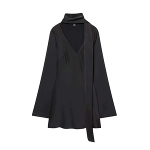 Elegant black satin V-neck maxi dress with long sleeves and integrated scarf detail