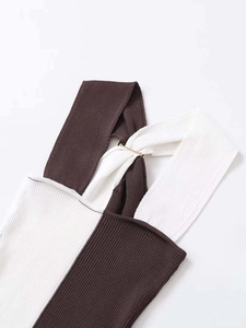 Detail of ribbed knit tank top with dark brown fabric and white trim metal ring decor
