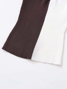 Detail of slim fit ribbed knit tank top with brown and white vertical patchwork