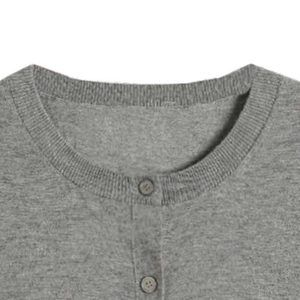 Retro grey knit cardigan with a classic round neck and elegant button-front closure