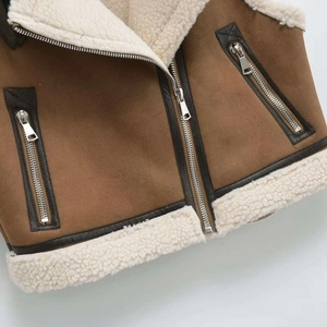 Brown faux suede vest with cream faux fur lining and asymmetrical zipper detail