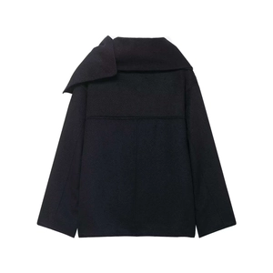 Macro view of the back of a navy wool coat with wide collar and premium fabric texture
