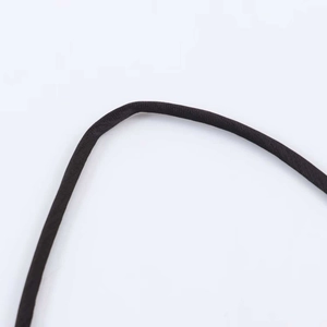 Detail of the black braided halter drawstring with fine texture for women dress