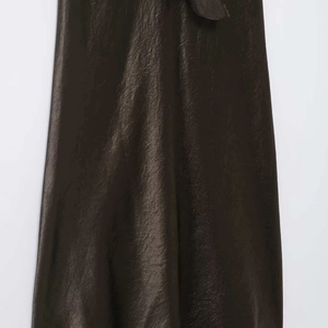 Elegant dark satin midi dress with silky texture and waist tie detail in deep coffee