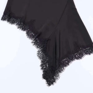 Elegant black satin halter dress with asymmetrical eyelash lace hem detail