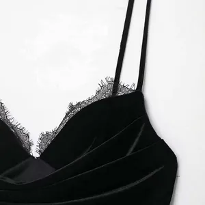 Elegant black velvet dress featuring delicate lace trim and minimalist thin straps