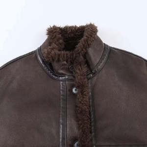 Vintage brown faux leather jacket with warm sherpa collar and button front closure