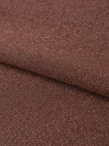 Close-up of bronze knit fabric with metallic shimmer and fine needlepoint texture