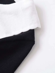 Macro shot of high-quality black and white contrast fine knit fabric and texture detail