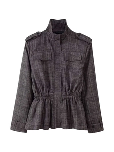 Close-up of checkered jacket featuring ruffled hem, large pockets and epaulets detailing