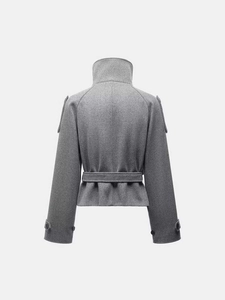 Detail view of the back of grey wool-blend short coat with belted waist and epaulettes