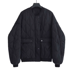 Women's classic black onion quilted jacket with metal snaps and ribbed trims