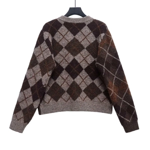 Fashionable argyle knit sweater cardigan with classic brown tones and soft plush texture