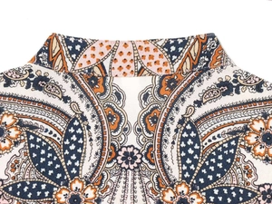 Detail of bohemian paisley print on standing collar woven summer shirt dress