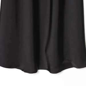 Elegant black satin slip dress for women featuring a smooth silky texture and premium hemline