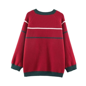 Red knit sweater with green and white stripes and ribbed trim on a white background