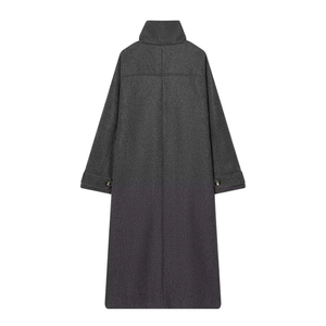 Detail view of the charcoal wool coat's high collar and back panel stitching