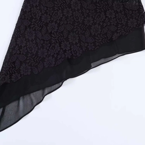 Women's asymmetric black floral lace camisole featuring a sheer layered chiffon hemline