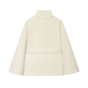 Detail view of cream-colored cape coat back showing waist strap and wool blend texture