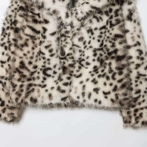 Women's faux fur leopard print jacket with plush texture and stylish loose fit design