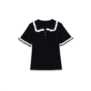 Women's black short sleeve knit top with white ruffled collar and silver buttons