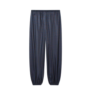Relaxed dark blue harem pants with brown pattern print and elastic cuffs on white back