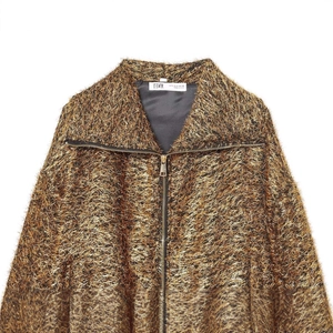 Golden metallic textured bomber jacket with full zipper and fuzzy fiber finish