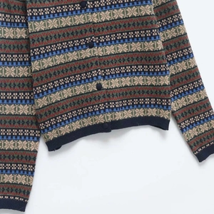 Vintage Fair Isle cardigan with colorful geometric jacquard patterns and round buttons