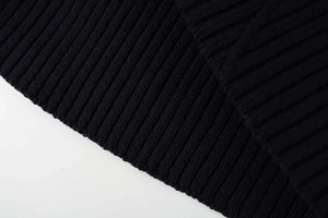 Detailed close-up showing the premium ribbed knit texture of this navy blue summer top