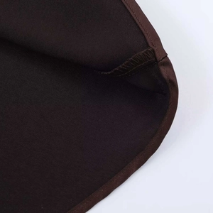 Detailed view of the dark brown satin dress showing refined edge stitching and fabric texture