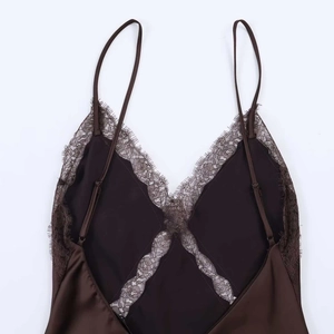 Close-up of deep brown silk satin midi dress with delicate eyelash lace and V-back detail