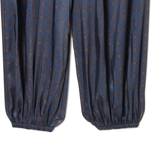Dark blue jacquard loose lantern pants featuring elastic cuffs and retro check pattern